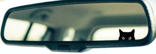 Small Black cat decal on a rearview mirror