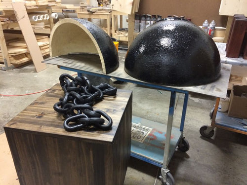 Disassembled chain chomp with wet black paint 