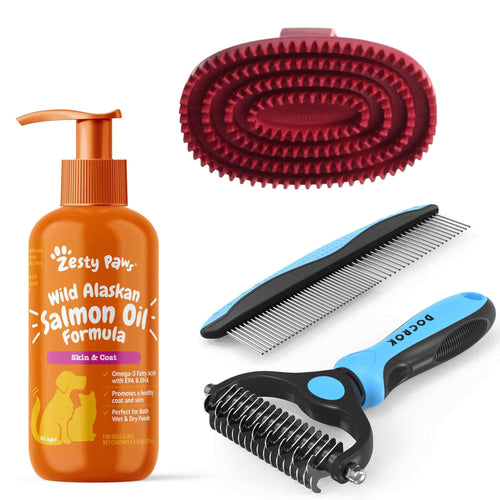 Pet care products including a bottle of Zesty Paws salmon oil, a red brush, a comb, and a deshedding tool on a white background.