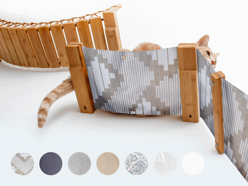 image of cat laying on hammock with fabric changing