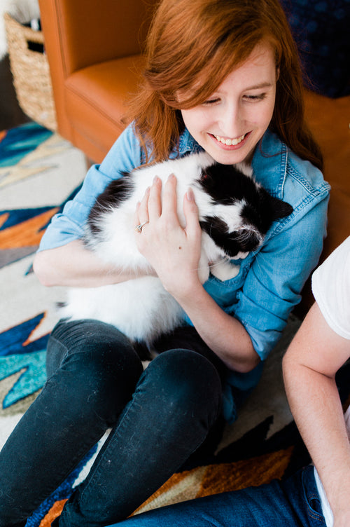 Interior Designer Hayley Williams holding her kitty