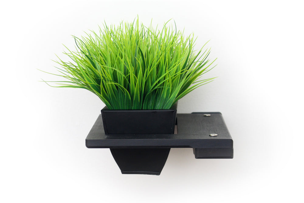 Image of a 9" Onyx Planter Shelf with faux greenery. Greenery not included.