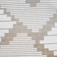 Textured fabric with a geometric pattern in neutral tones.