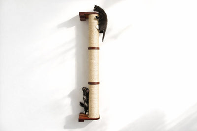 Two small animals climbing a cylindrical cat scratcher on a white background