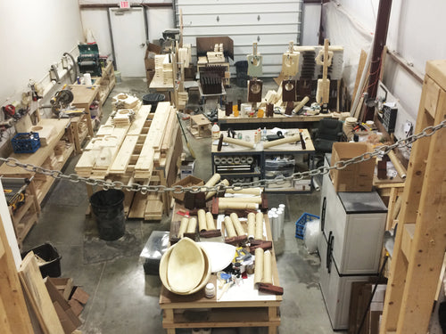 messy shop with parts gathered on table with foam ball pieces