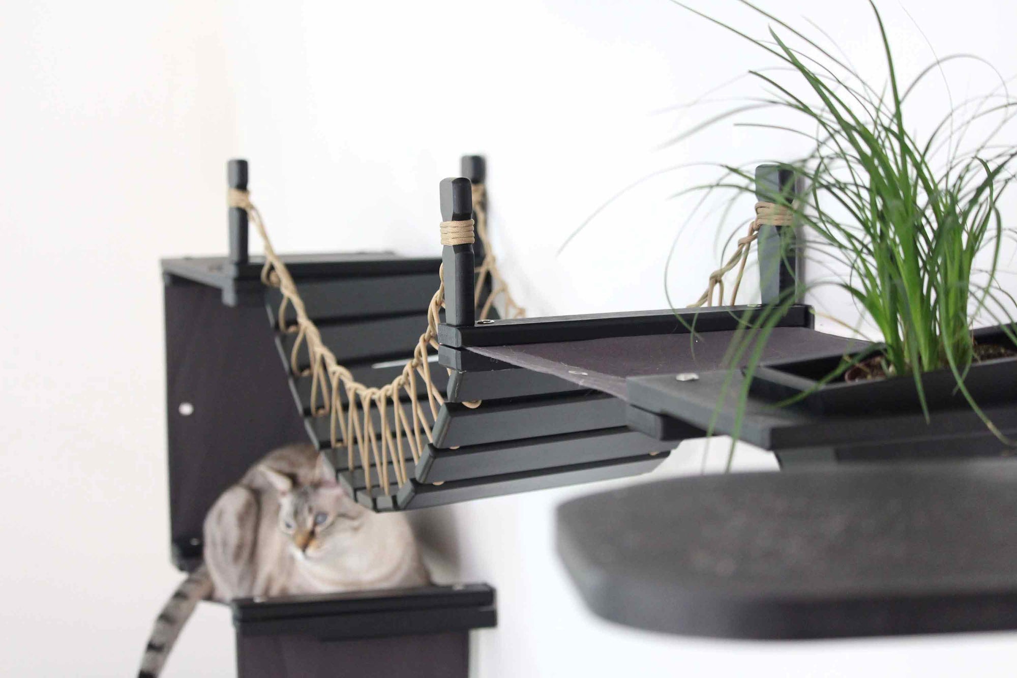 large cat tree with onyx stain and gray fabric