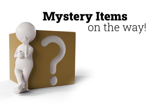 White figure with a question mark on a brown box with text 'Mystery Items on the way!'