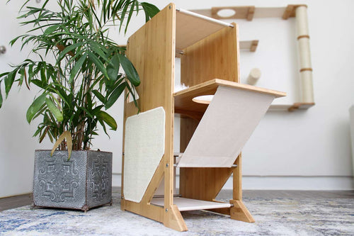tall wooden cat tree with hammocks and scratching pads