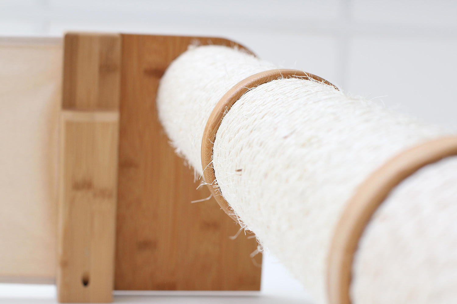 close up of wall mounted scratching post and connectors