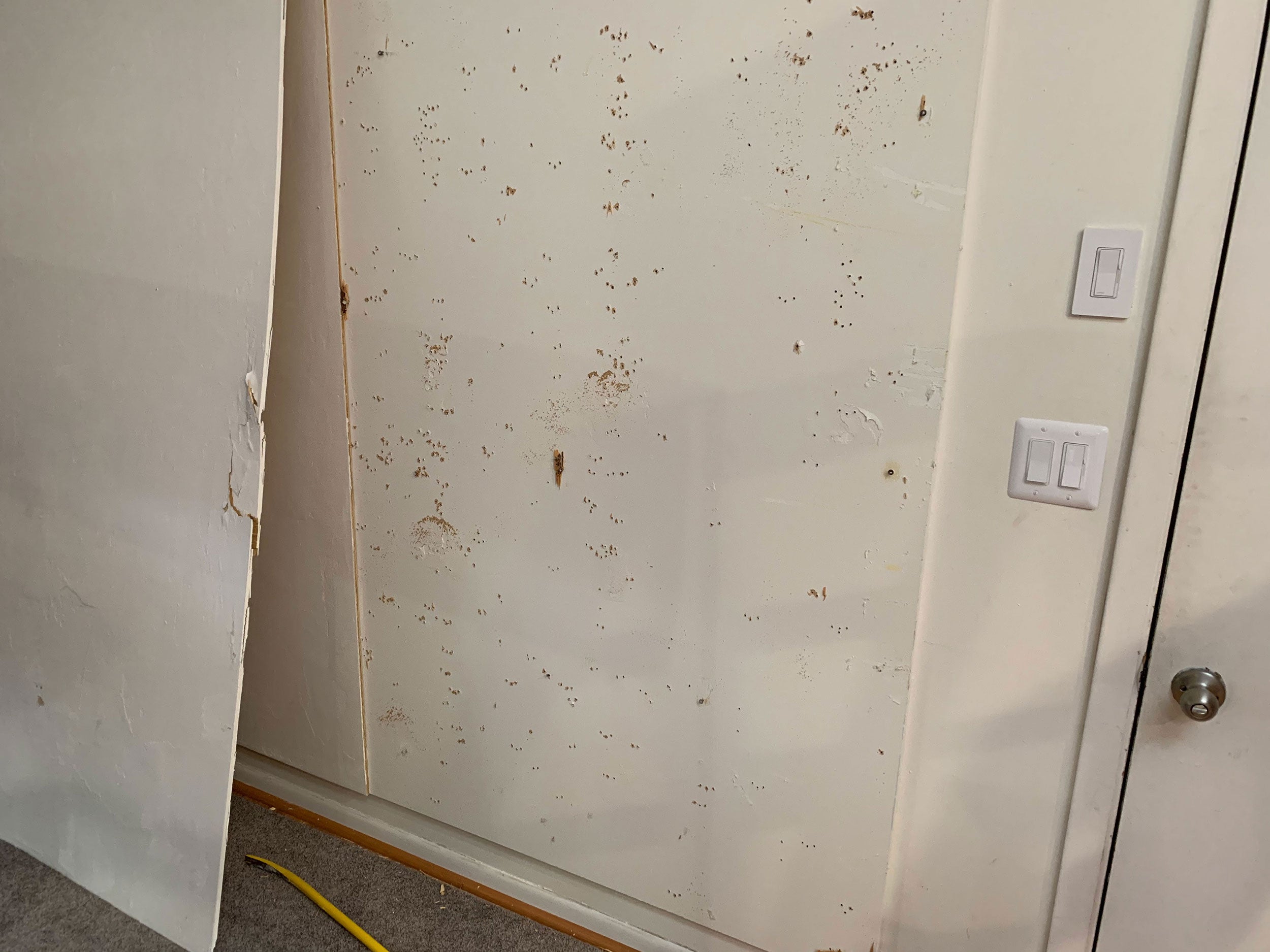 wall full of holes
